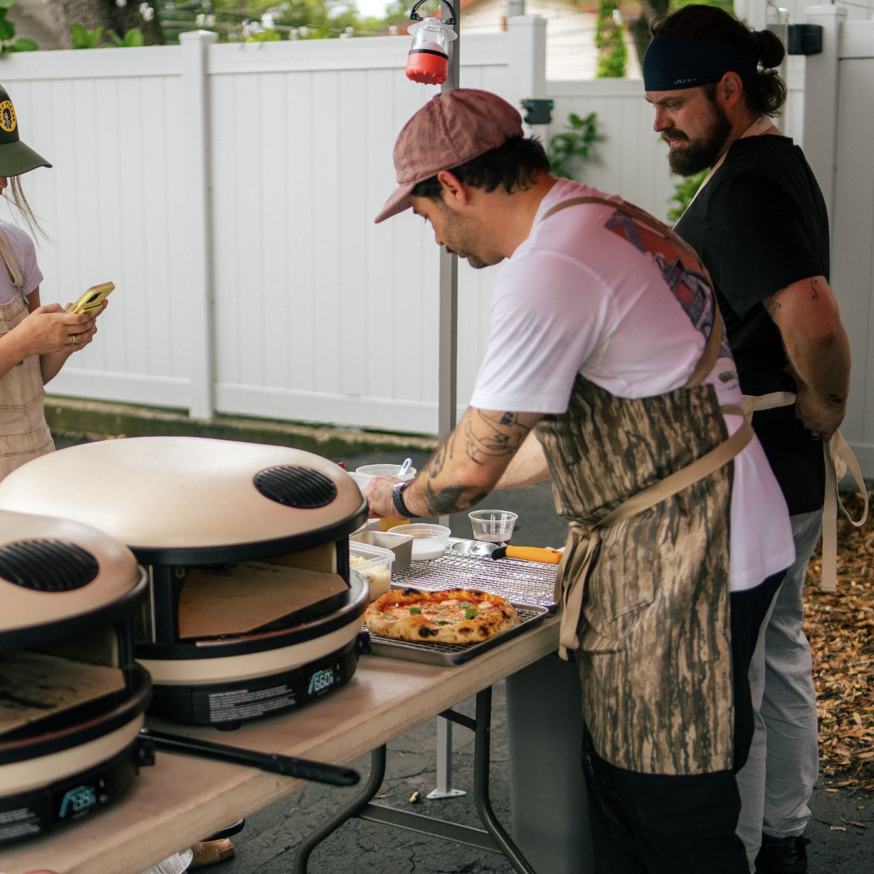Julian De Garden and Seth Parker prepping the ovens on Instagram