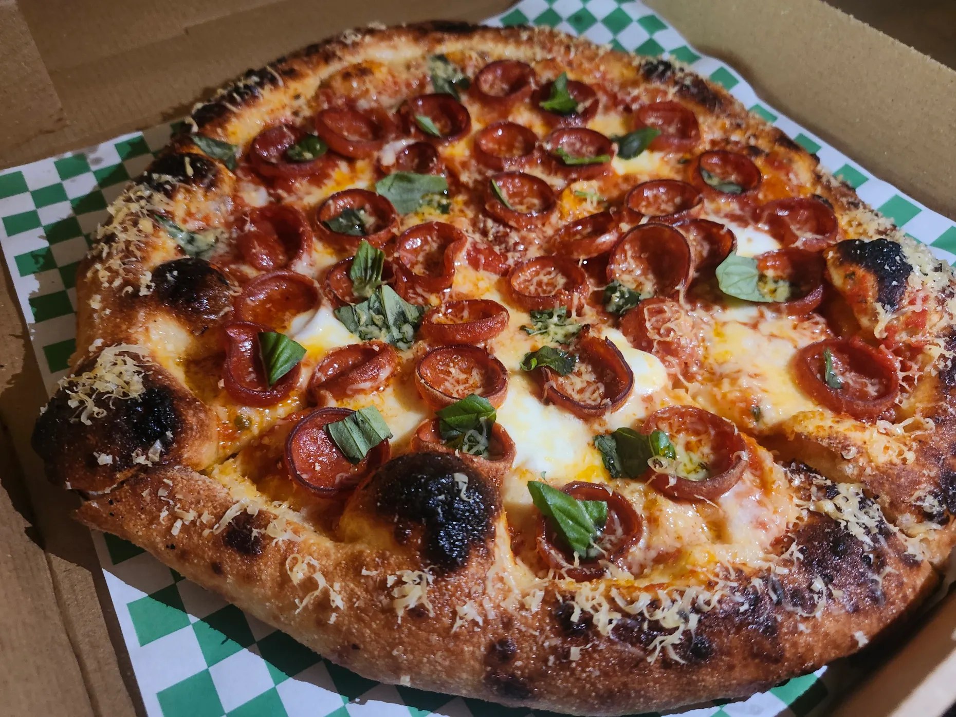 Burnt Mouth Pizza's classic pepperoni pie, as featured in the Orlando Sentinel